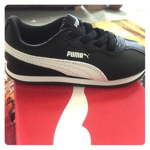 Never worn Puma Turin II AC black and white